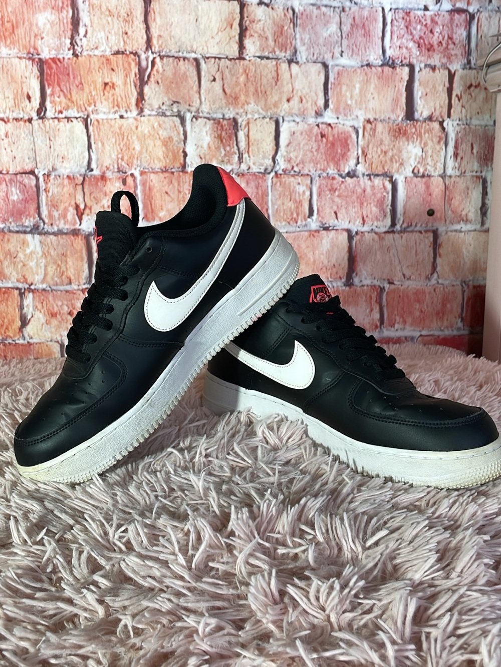 Nike Black Sneakers with White Swoosh and Pink Heel